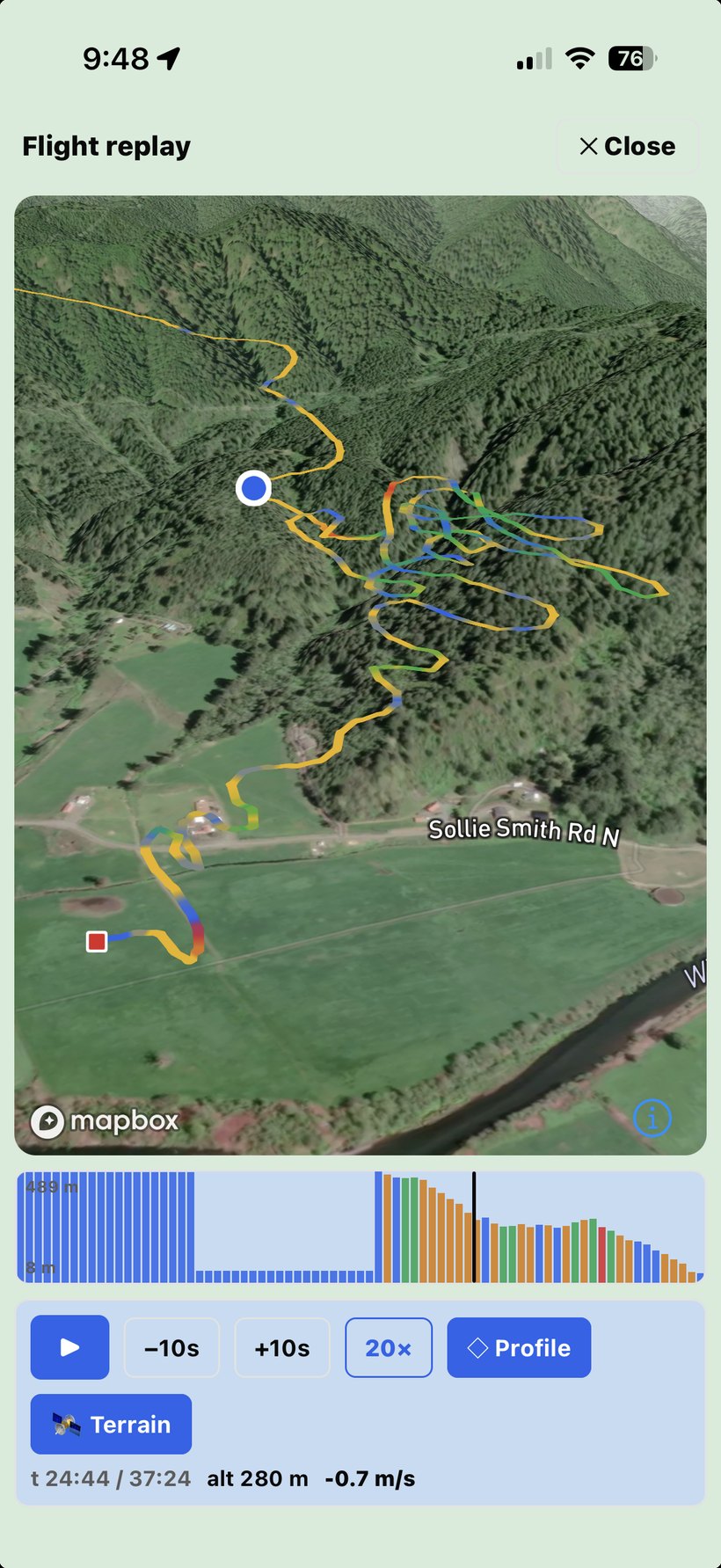 Skybase 3D flight replay — the flight track floating over Mapbox 3D terrain, with a barogram scrubber